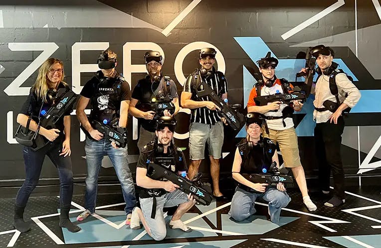 The team playing VR